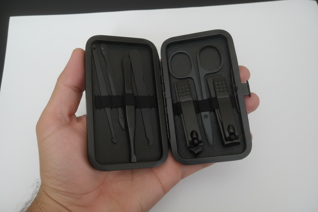 Palm Sized Black Grooming Kit Hand Size Reference